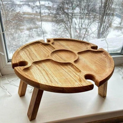 Eleganter Design-Holz-Aperitif-Tisch mit Pflanze